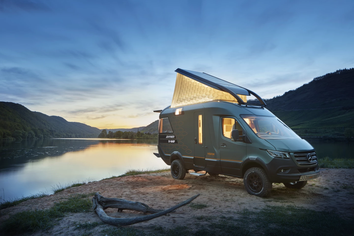 The light in the Hymer VisionVenture's pop-up roof teams with the white inflatable sides to create a soft, ambient glow