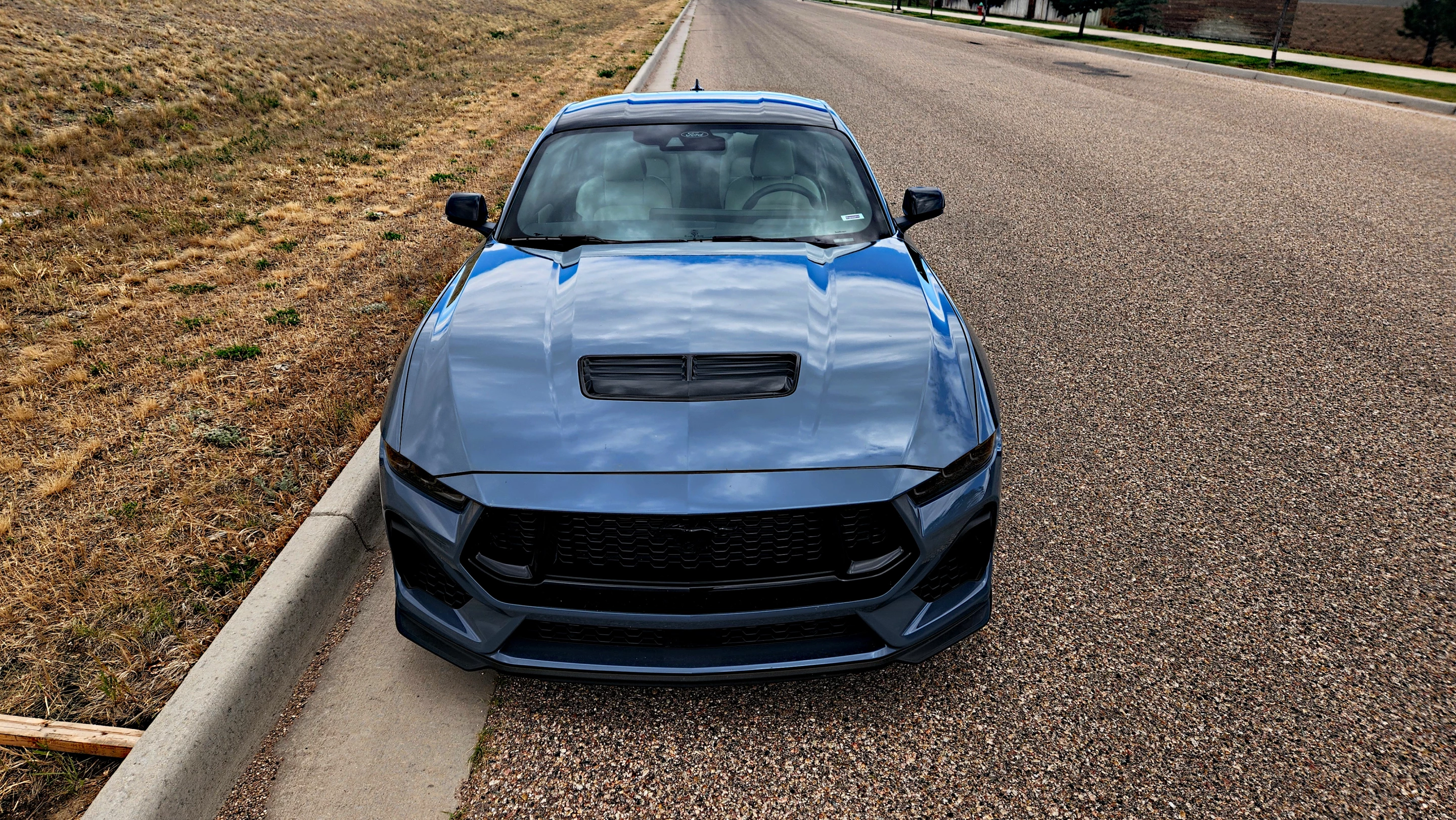 The hood scoop is standard on the V8-powered Mustang models to allow a little more breathing room for the engine