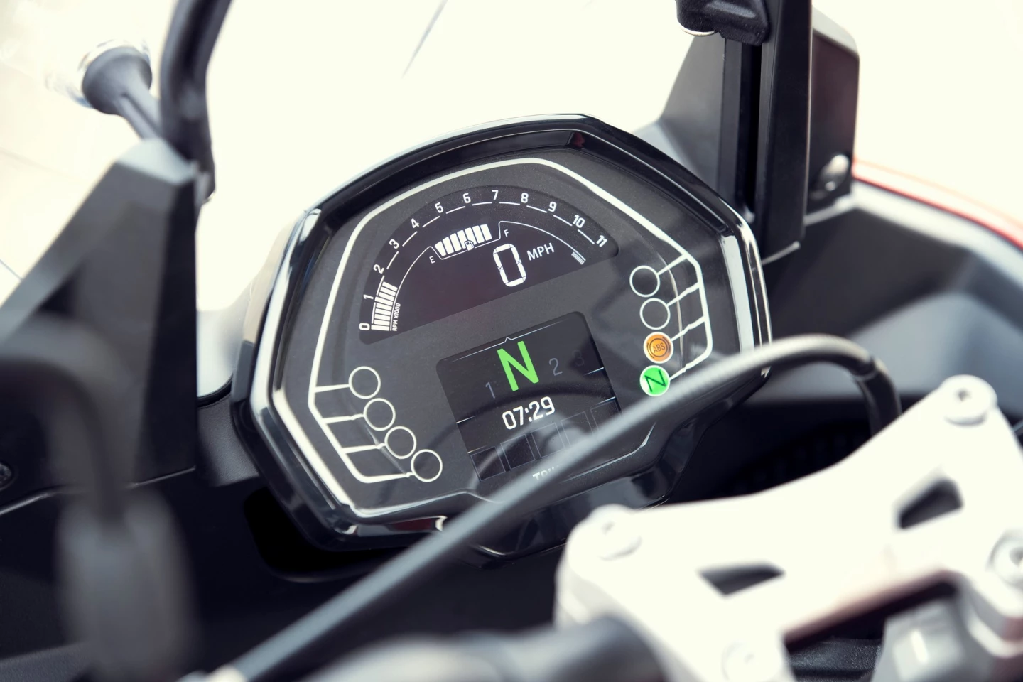 The rider of the 2022 Triumph Tiger Sport 660 sits in front of a TFT screen that can be optionally enhanced with a Bluetooth connectivity kit