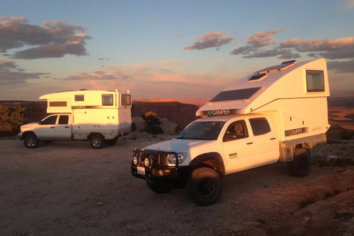 The V2 poses with the original XPCamper in the background