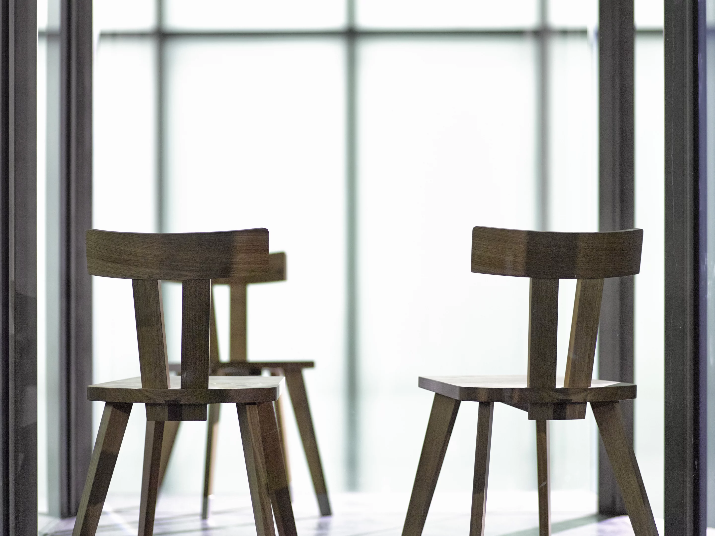 Smiljan Radic's bus stop uses simple chairs instead of built-in benches (Photo: Adolf Bereuter)