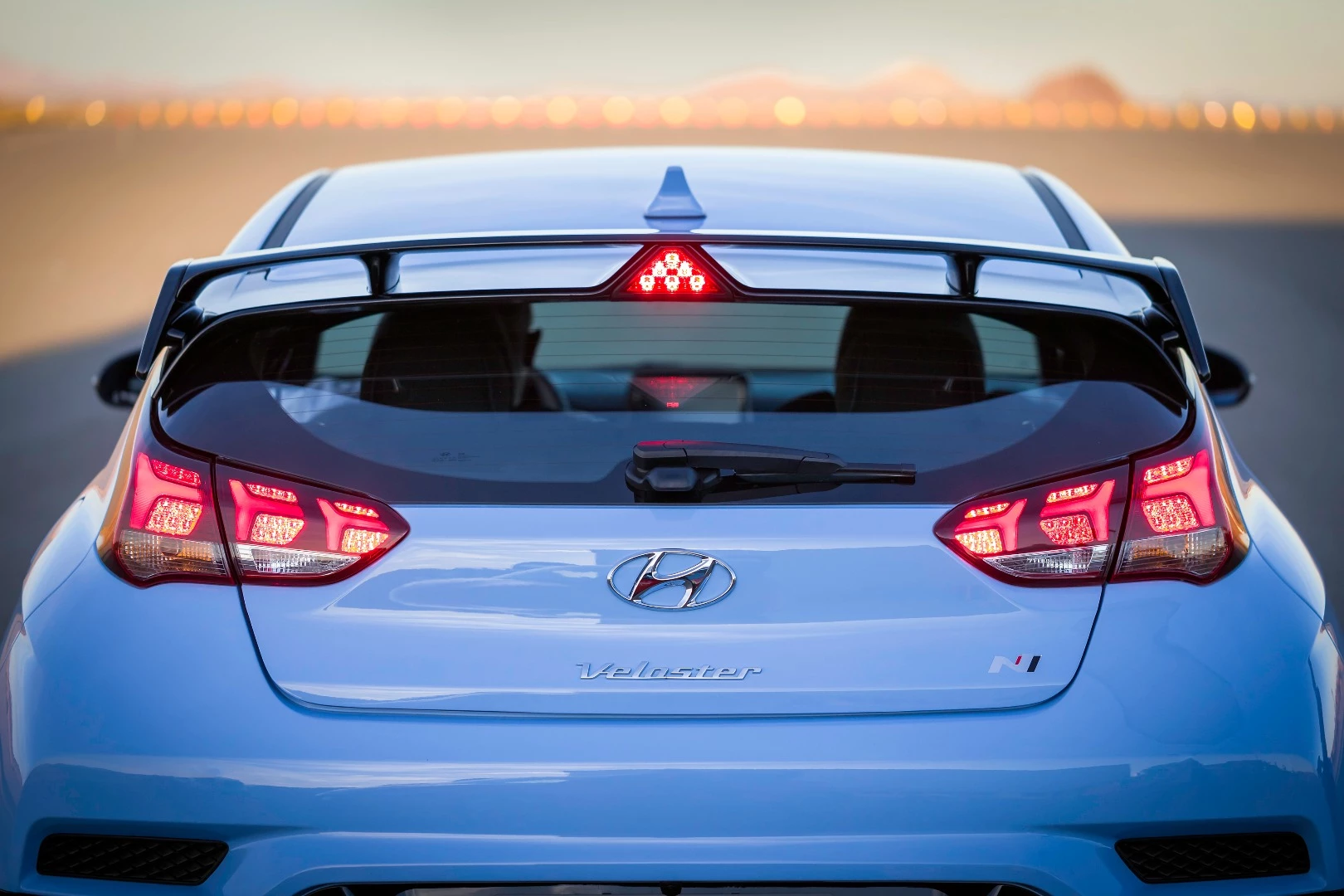 The rear diffuser on the 2019 Hyundai Veloster Turbo and Veloster N (here) are more pronounced