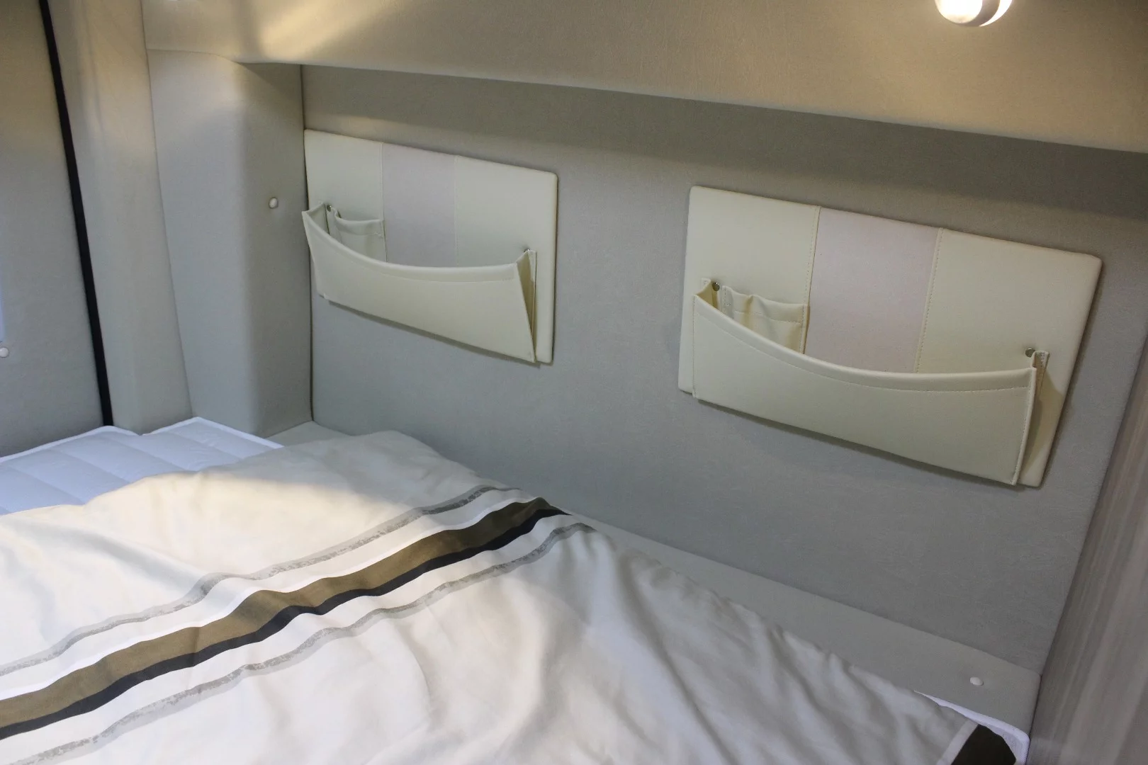 Bedside storage pockets