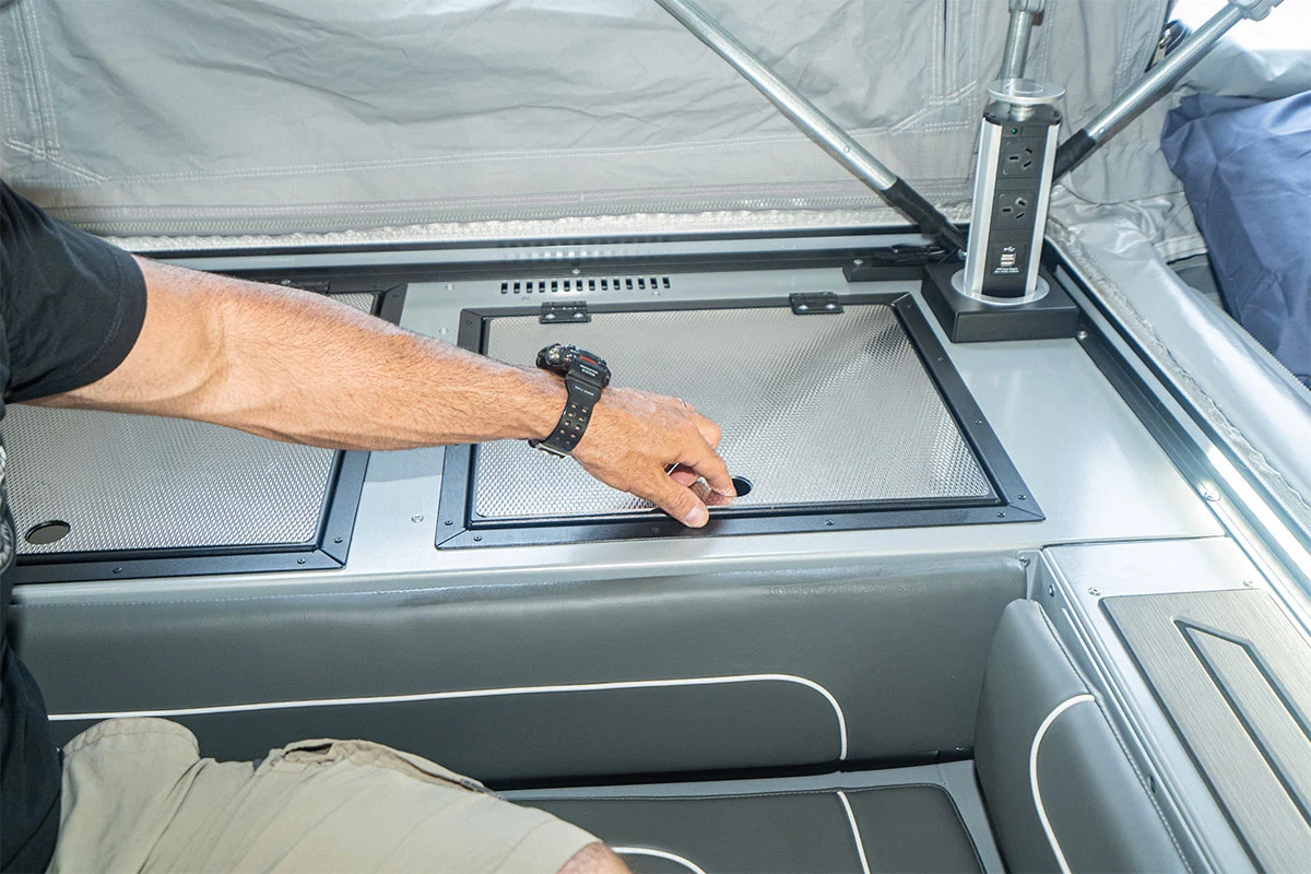 The available "pop-up cafe" disappears neatly into the side console