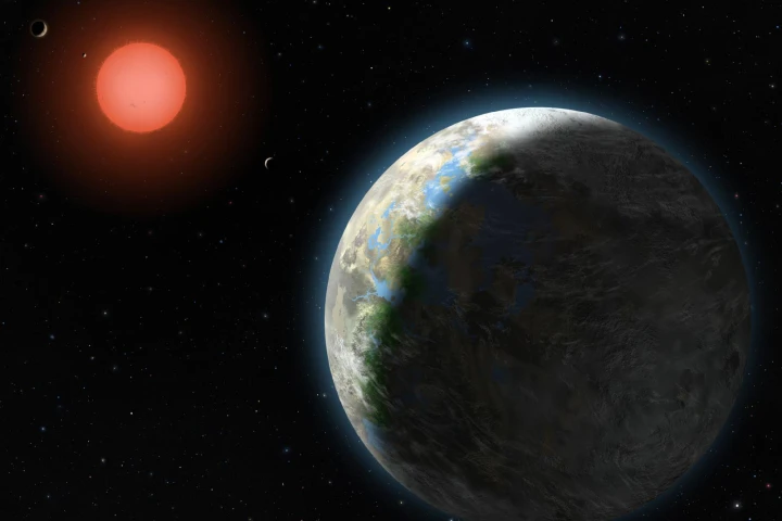 Artist's conception showing the inner four planets of the Gliese 581 system and their host star (Image: Lynette Cook)