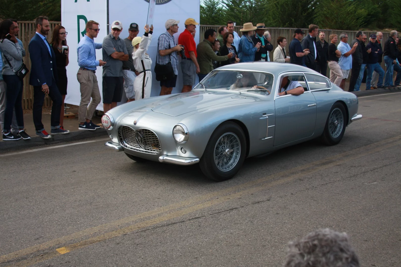 A Zagato bodied Maserati starts on The Pebble Beach Concours d'Elegance Tour d"Elegance