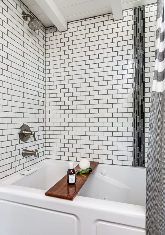 A full-size jacuzzi bath is just one of several features that makes Alpha Tiny House a standout example of small luxury living