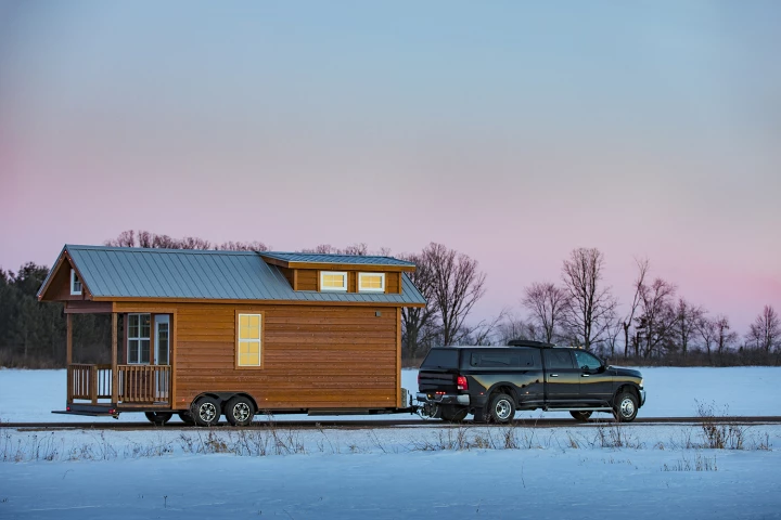The Tradition is offered in multiple sizes, including a 21 ft (6.4 m)-long model and a larger 25 ft (7.62 m)-long version with covered porch