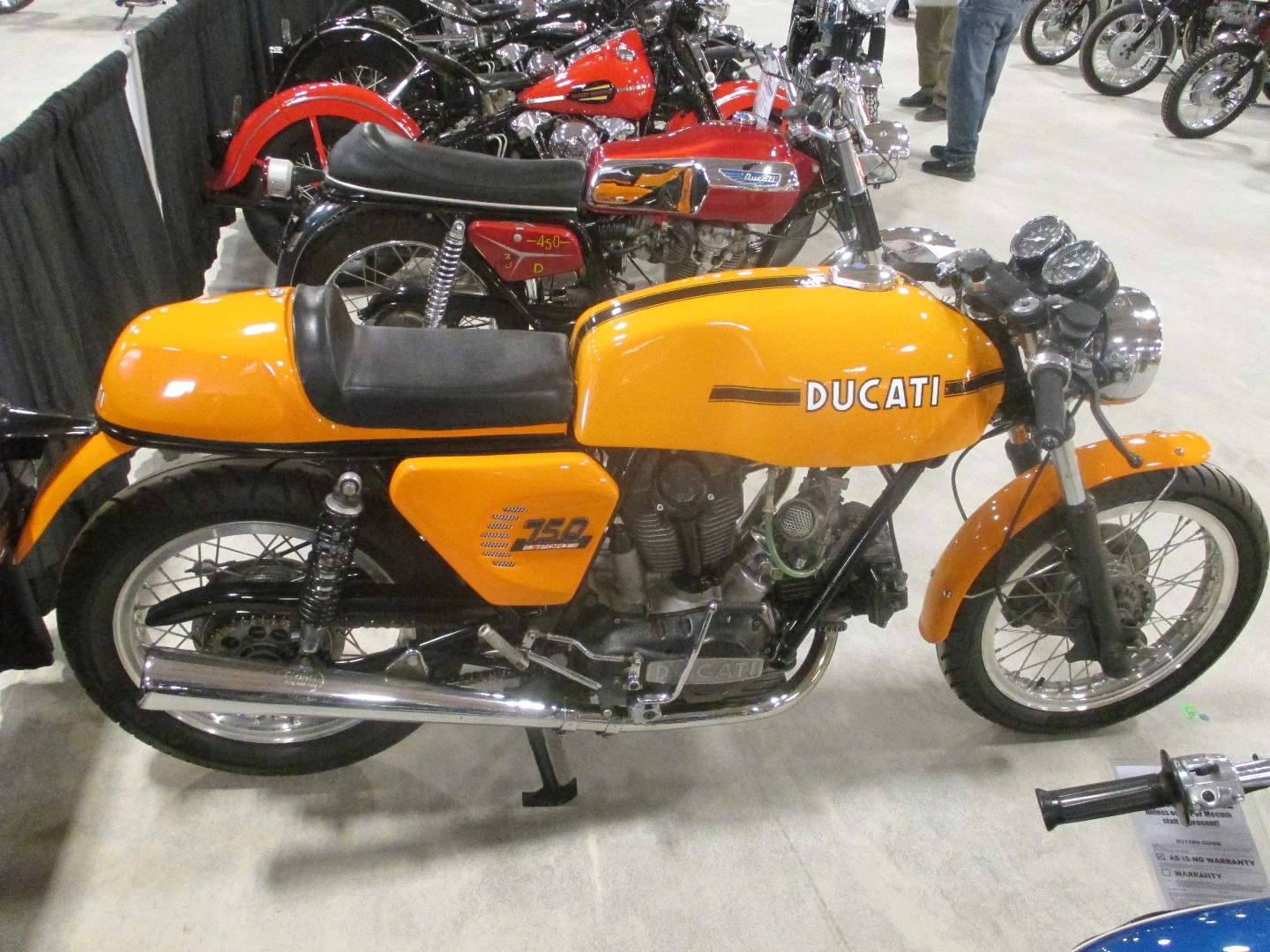 As we wrote previously regarding the 1974 Ducati 750 GT that fetched $17,050, the Ducati 750 Sport prices at auction have risen with the tide caused by the 750 SS. The Ducati 750 SS is now selling into the stratosphere (like this one for $176,000), and this 750 Sport was the highest priced Ducati of the Vegas auctions. If there is a great irony about all of this, the reputation all stems from Paul Smart's win at the Imola 200 race in 1972, and a few years ago, that bike sold at auction for just €70,200. Anyway, this appears to be a bevel-driven 750 sport motor with a Dr. Desmo kit fitted. It sold for $55,000
