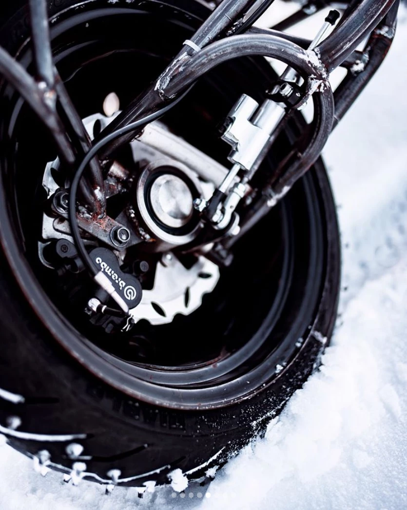 The hand-made hub-steer system on each front swingarm