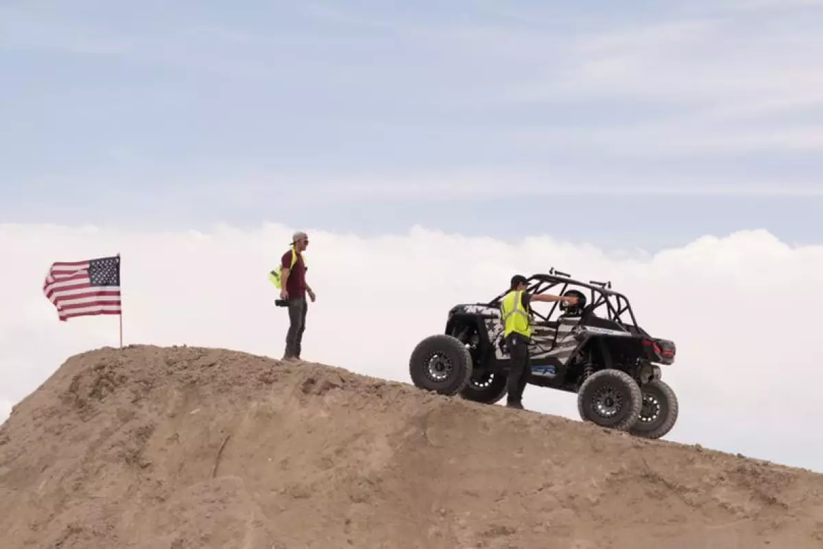 Godfrey prepares to break the world distance jumping record in a Polaris RZR