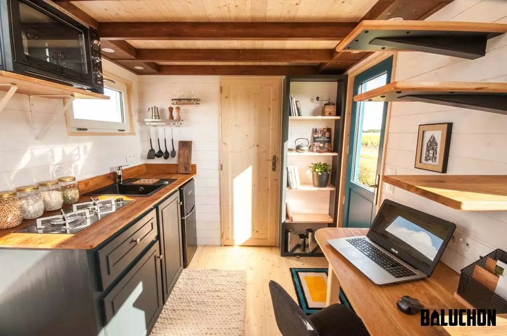 View towards the Valhalla's kitchen. The bathroom is behind the door pictured