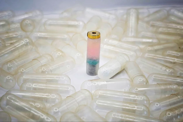 The MEDS device, with ingestible capsules for scale