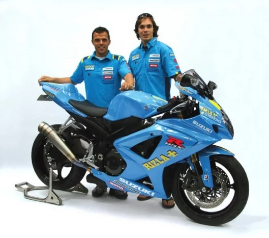 Works riders Loris Capirosi and Chris Vermeulen and the replica