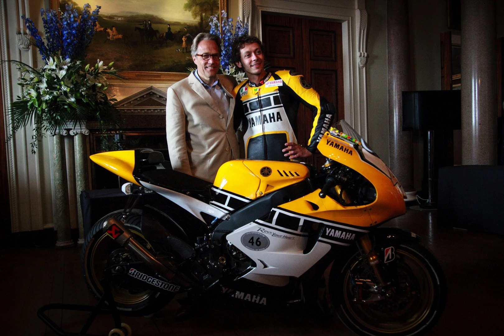 Lord March and Valentino Rossi with Rossi's YZR-M1 inside Goodwood House