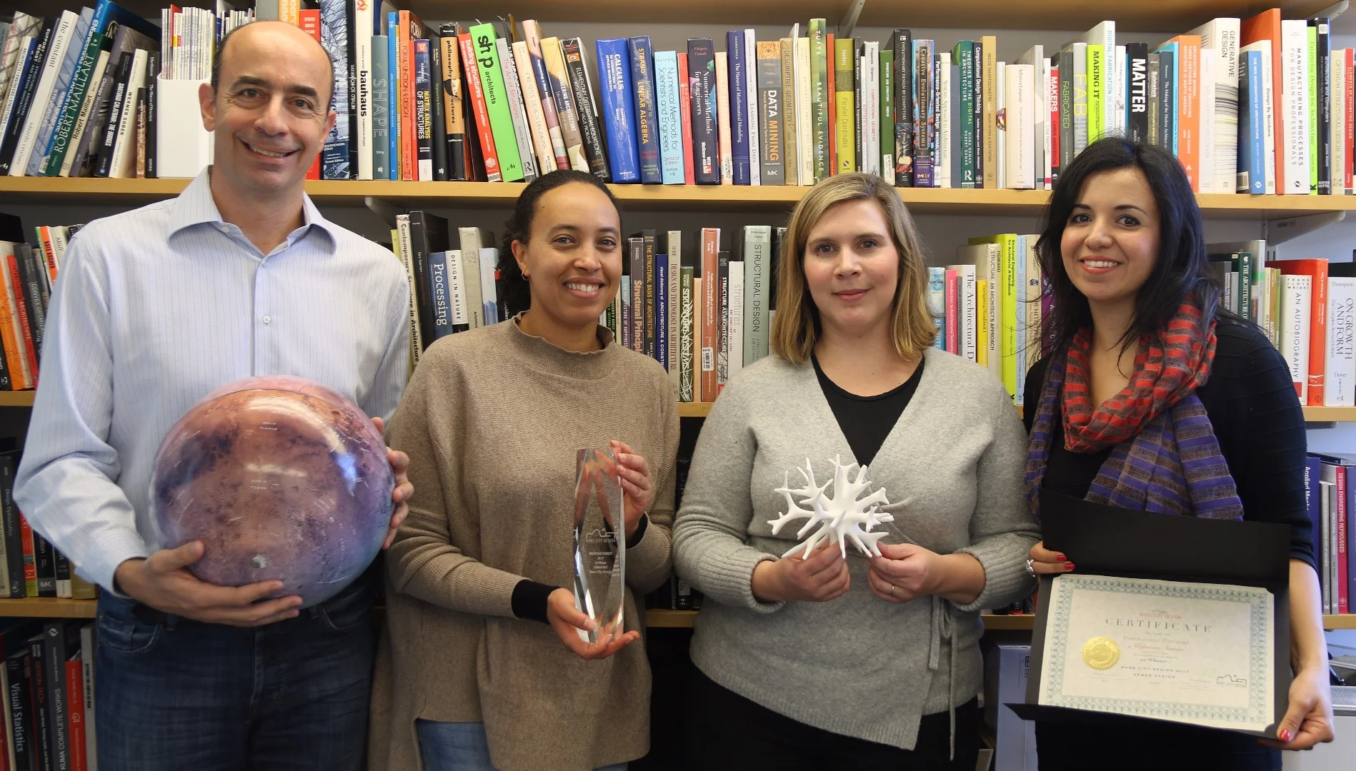 Left to right: Team members George Lordos, Alpha Arsano, Caitlin Mueller, and Valentina Sumini