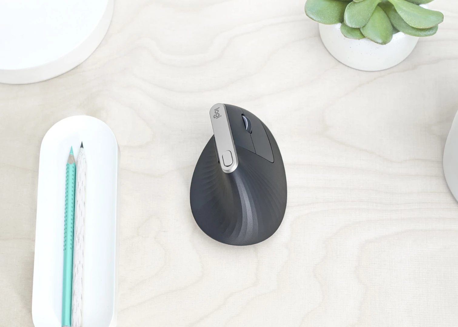 The Logitech MX Vertical features a scroll wheel and five buttons