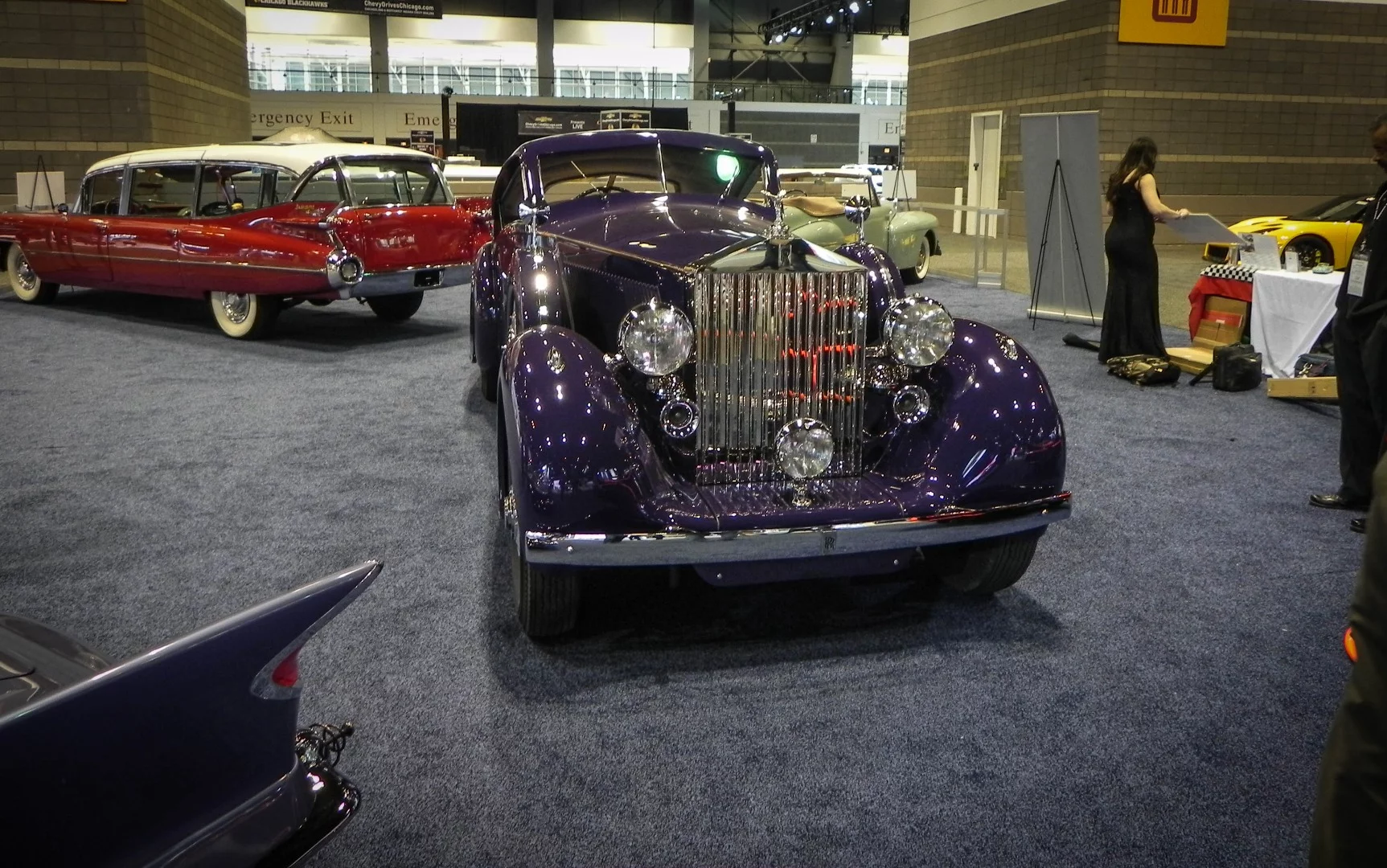 Showcases of old cars are also on display at the Chicago Auto Show, including this beautiful Rolls Royce and the unusual '59 Cadillac Broadmoor Skyview behind it