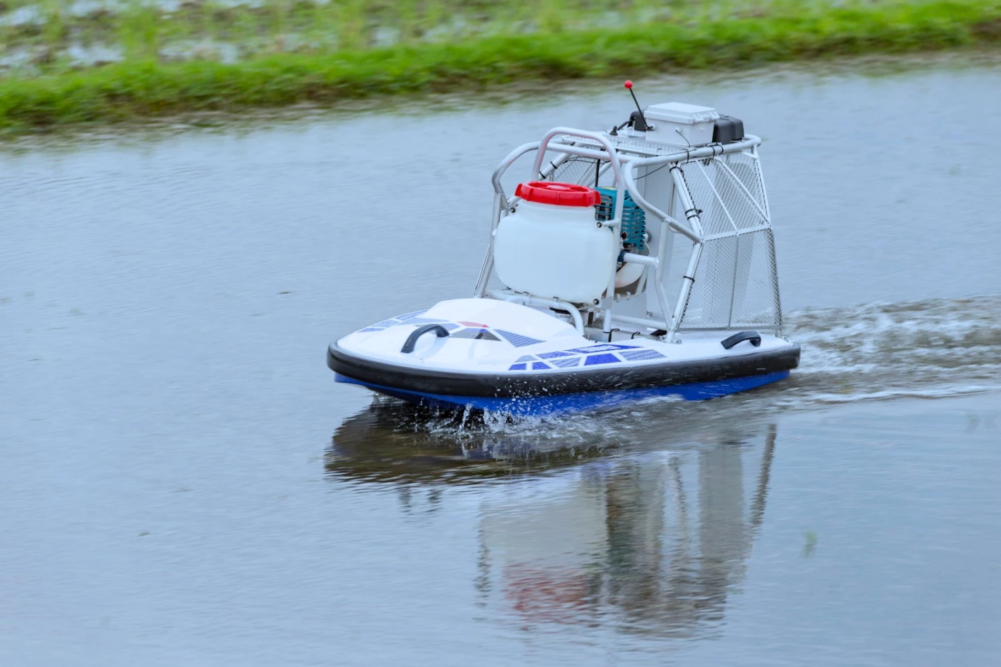 The 2018 Yamaha Water Strider unmanned boat is built specifically for remotely controlled herbicide spraying in rice paddies and includes a gyroscope and a revised chemical discharge volume valve (2-stage to 3-stage) in comparison to the 2017 model