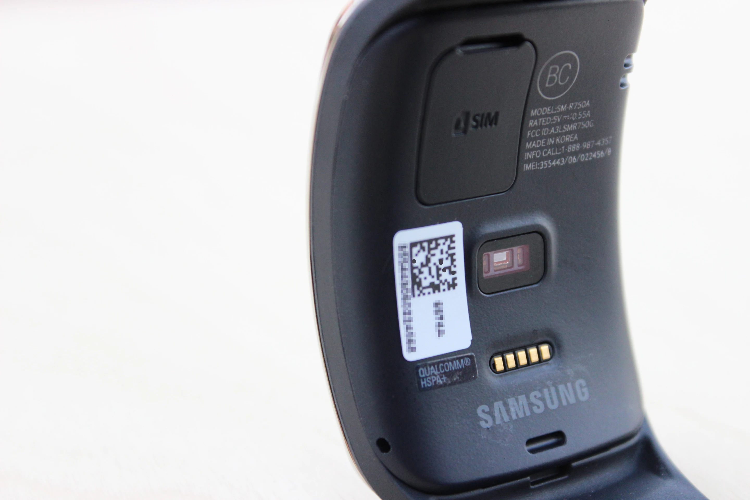The heart rate sensor, charging coil and SIM card slot on the back of the Gear S (Photo: Will Shanklin/Gizmag.com)