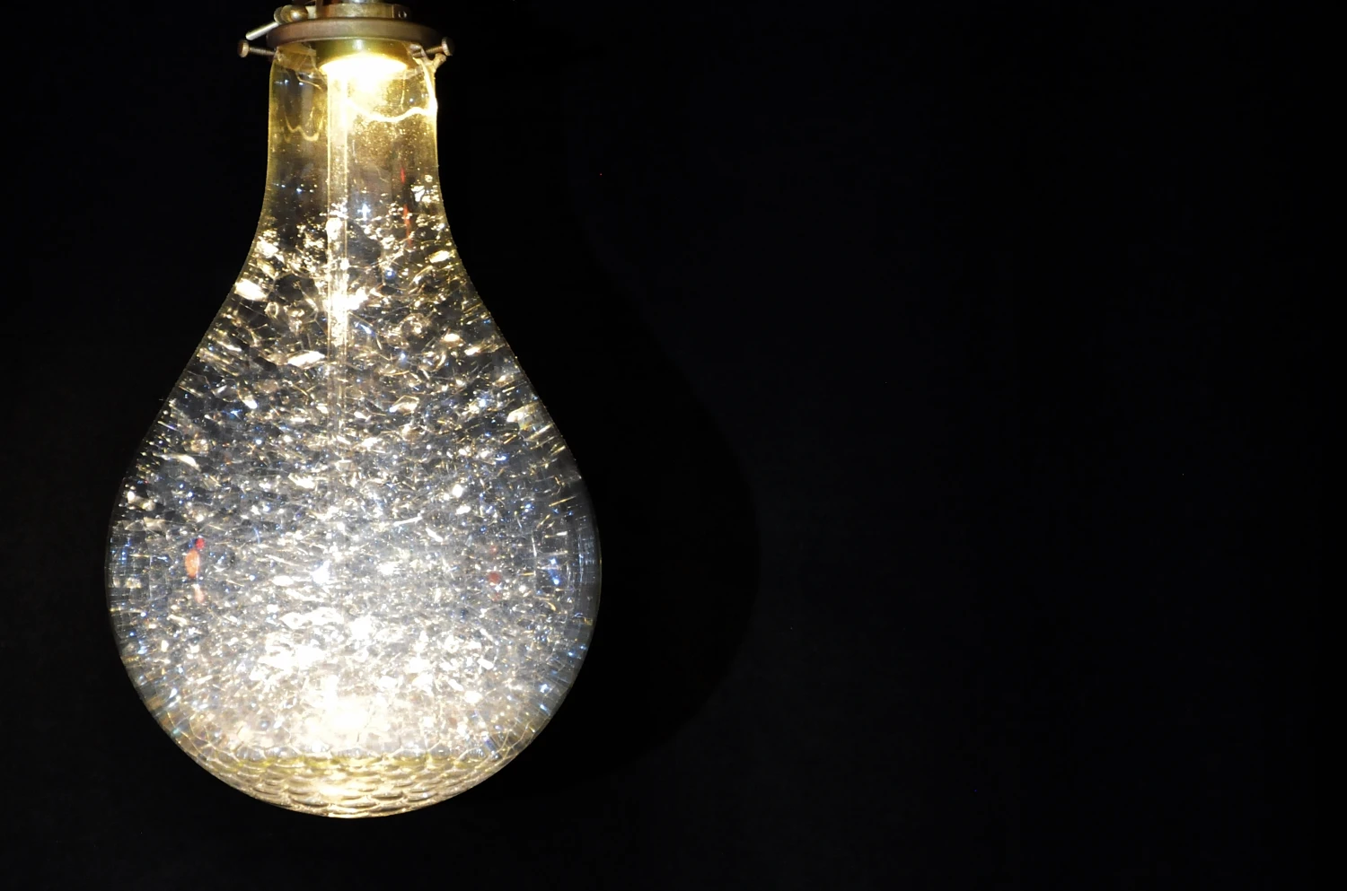 The internal soap bubbles create a dramatic light bulb by Void Setup, Tokyo