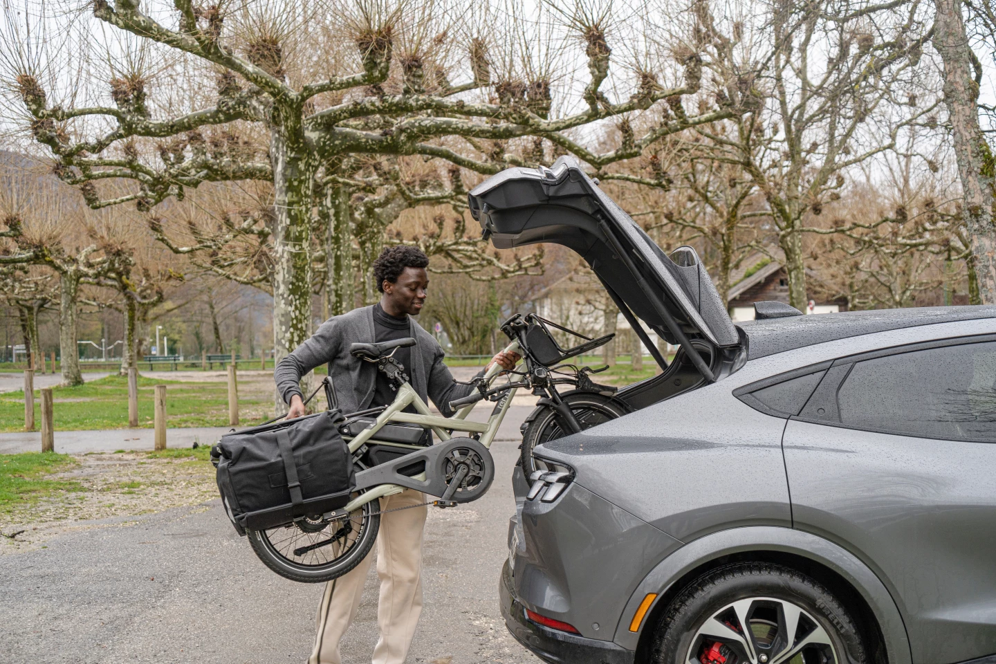The seat can be lowered and the handlebar collapsed down for transport in a SUV