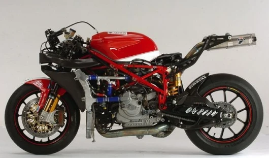 The Ducati 999 factory machine has found more horsepower, set pole and scored a podium in the first round. It will not dominate in 2005 as it did in 2003/4.