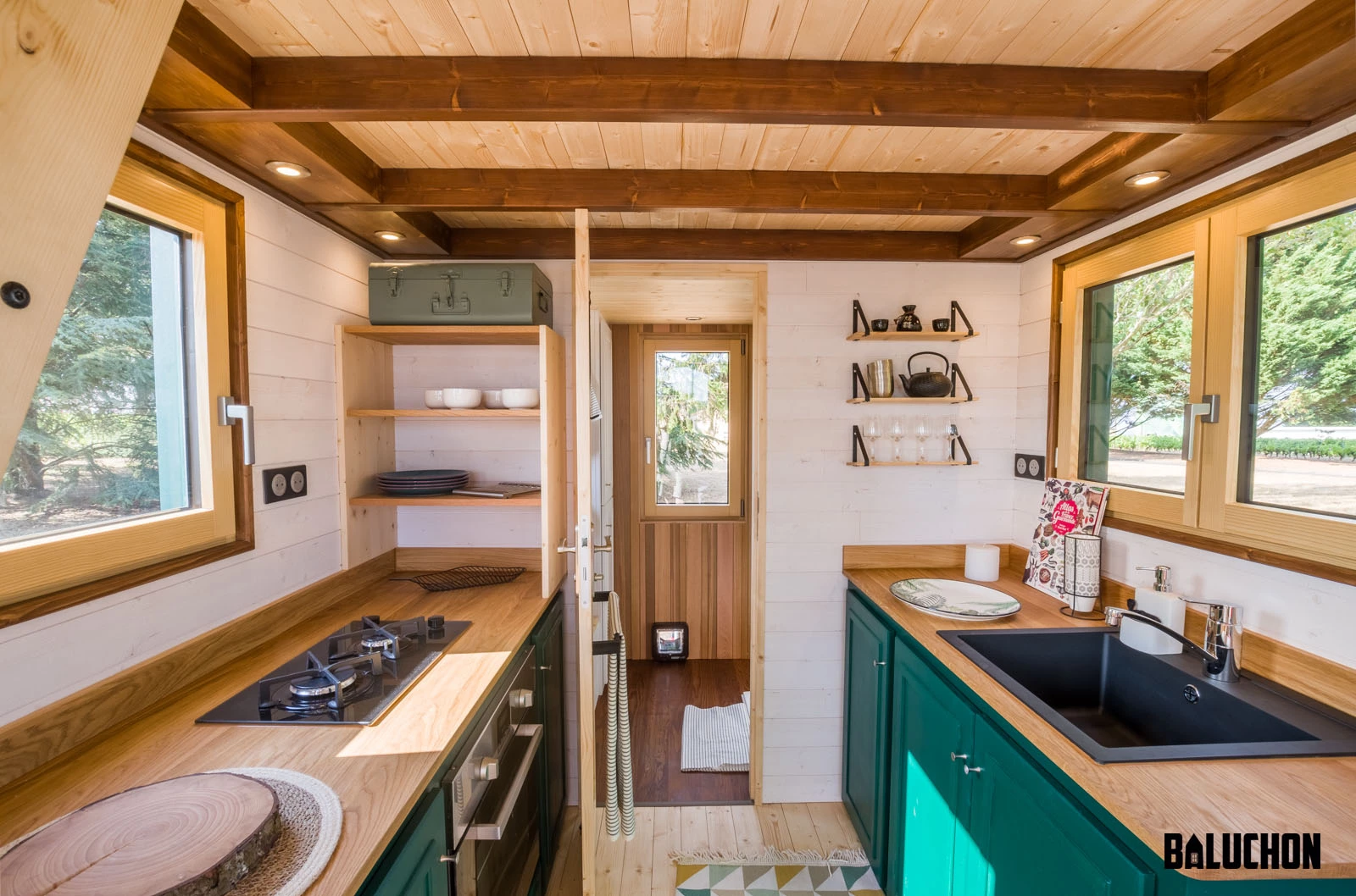 The Hauméa tiny house's interior walls are finished in spruce