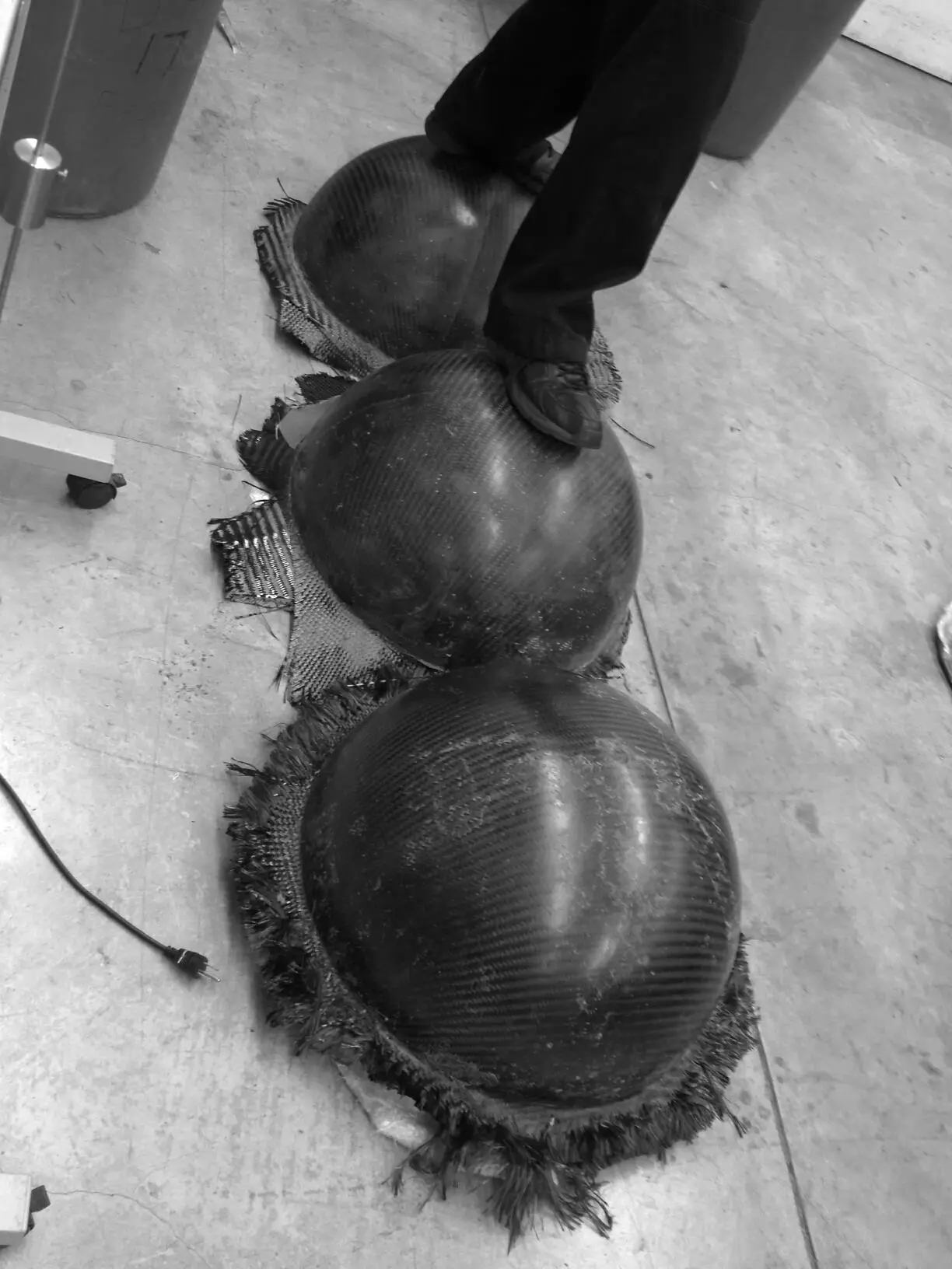 The two halves of these shells were subsequently joined to form a sphere and then coated with a durable industrial rubber for traction