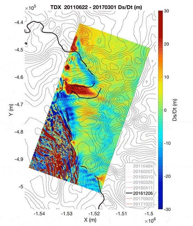 A map showing changes in topography at Thwaites Glacier, between 2011 and 2017. Red areas indicate the highest rate of sinking, with the section in the middle representing the newly-found giant cavity, and the bottom-left corner showing extensive calving