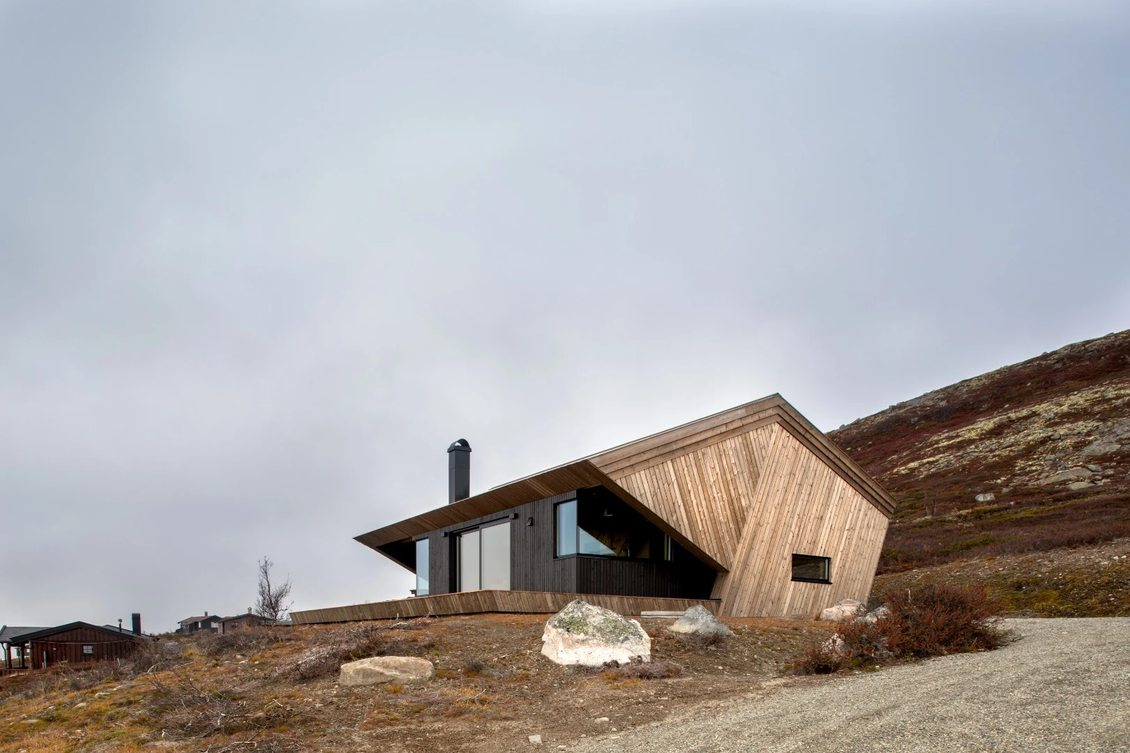Constraint often provides fertile ground for inspiration and this was indeed the case with Arkitektværelset AS' Hooded Cabin