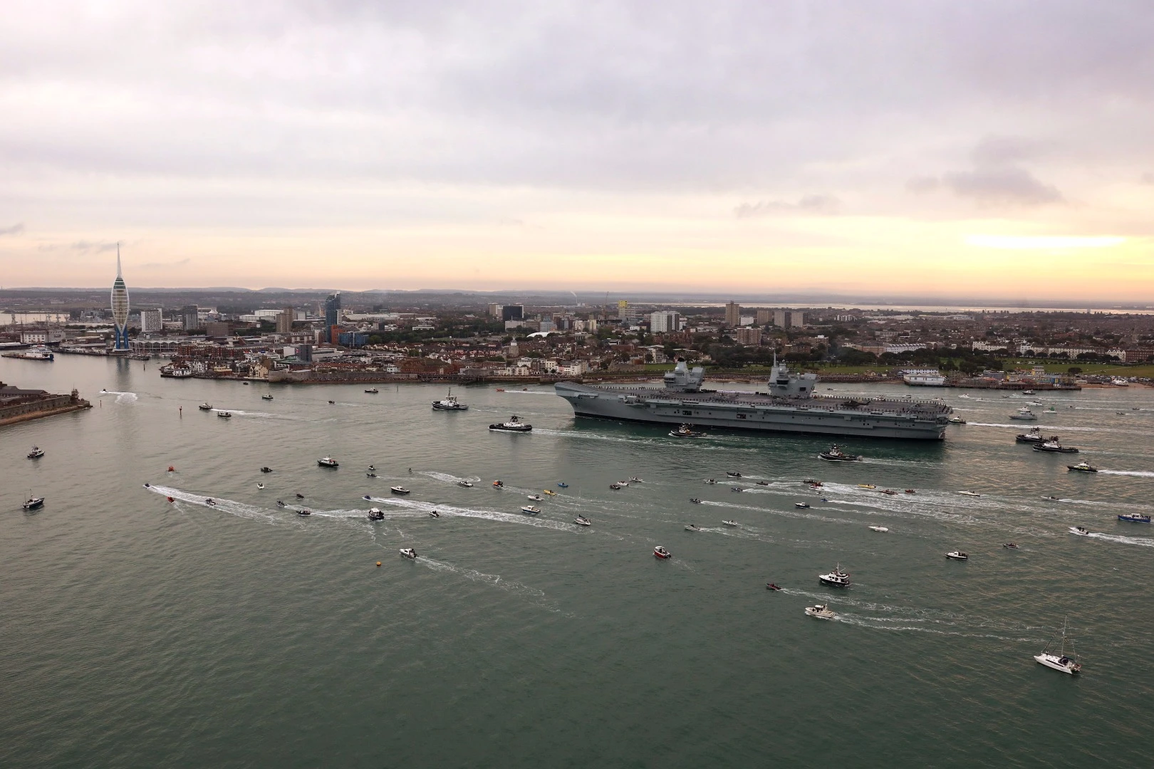 HMS Queen Elizabeth with Portsmouth in the background