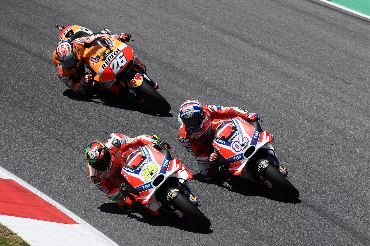 Ducati riders Andrea Iannone (#29) and Andrea Dovizioso (#4) often choose different wing configurations, while Dani Pedrosa (#26) rarely uses them on his Honda RC213V