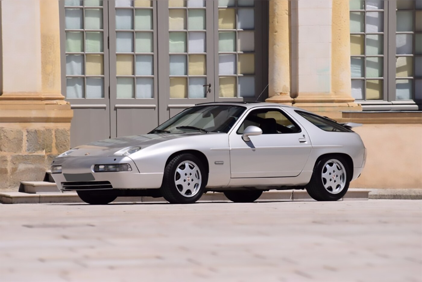 Artcurial Monaco July 2, 2017 Auction: A rare GT version of the 928 with factory sunroof and leather interior, a recent coat of paint and a general freshen. The most significant aspect of the car is that it was sold new to Johnny Hallyday, the French Elvis, so it will retain its value better than most. Auction Description