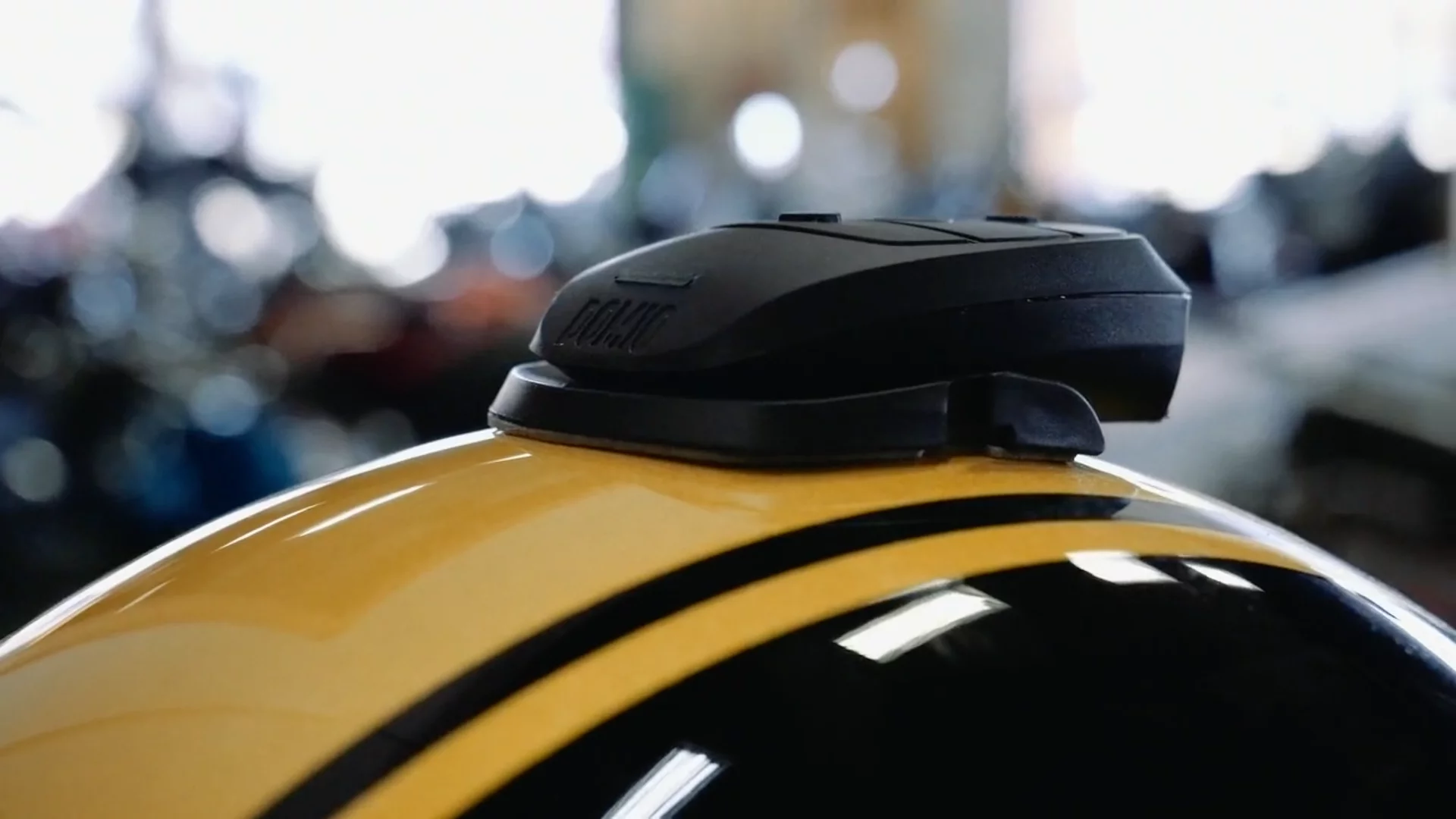She's a chunky one, alright – the Domio audio unit sitting on top of a helmet