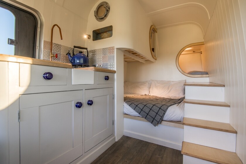 The lower bed doubles as a comfy day sofa