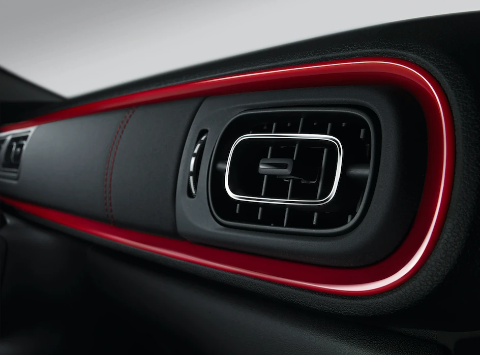 The horizontal dashboard is designed to make the cabin feel wider