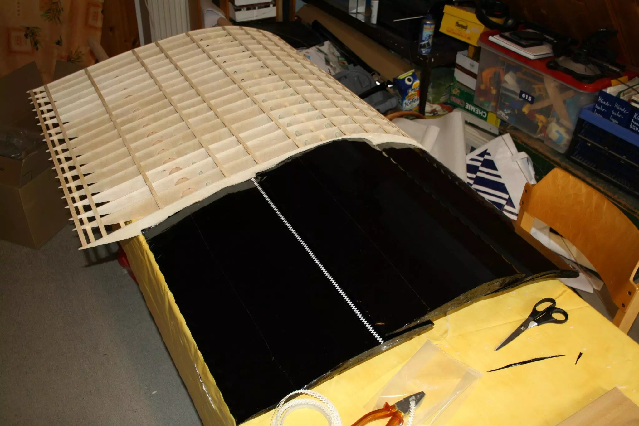 Wing assembly being covered