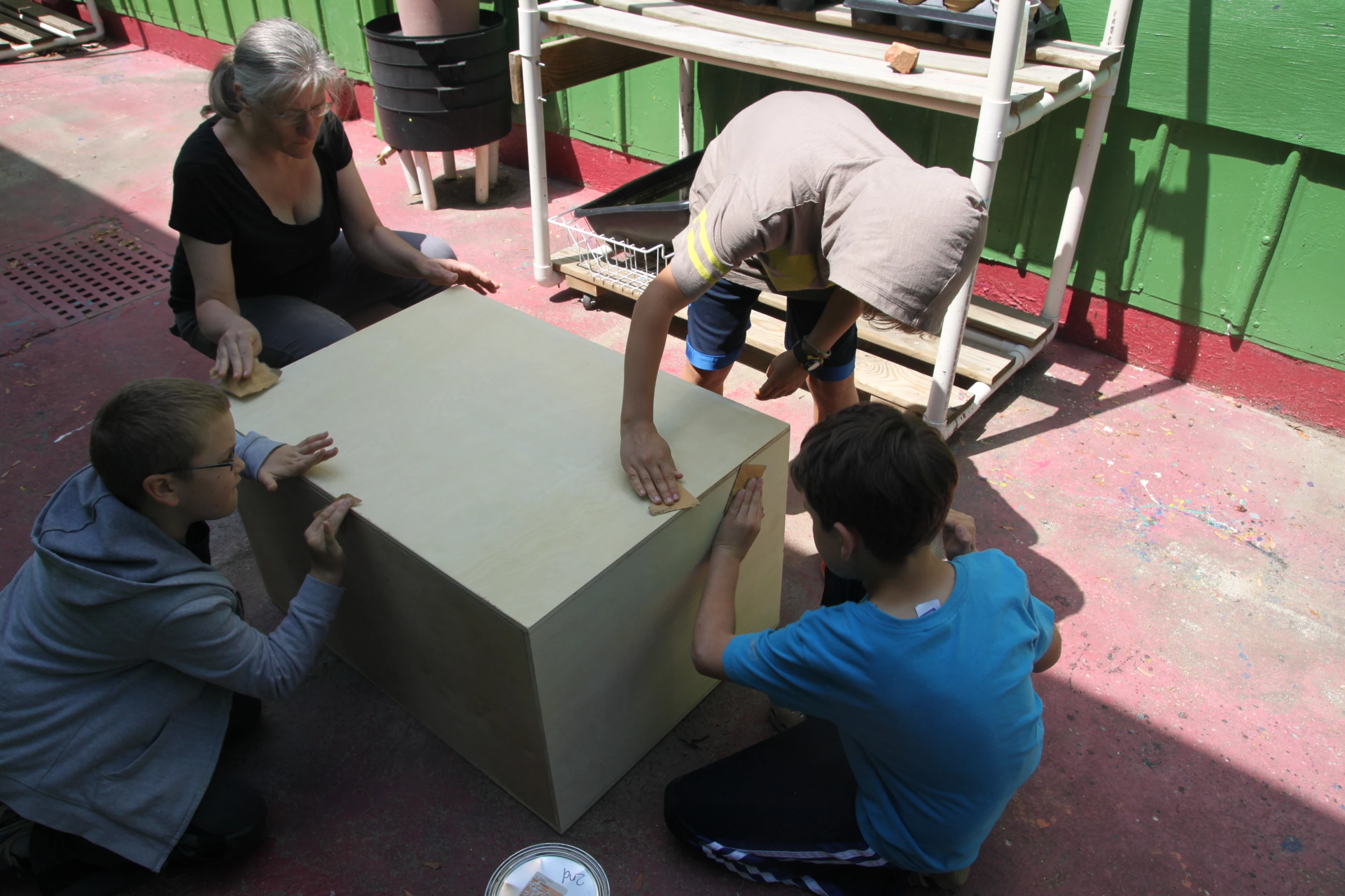 Students working on the battery box