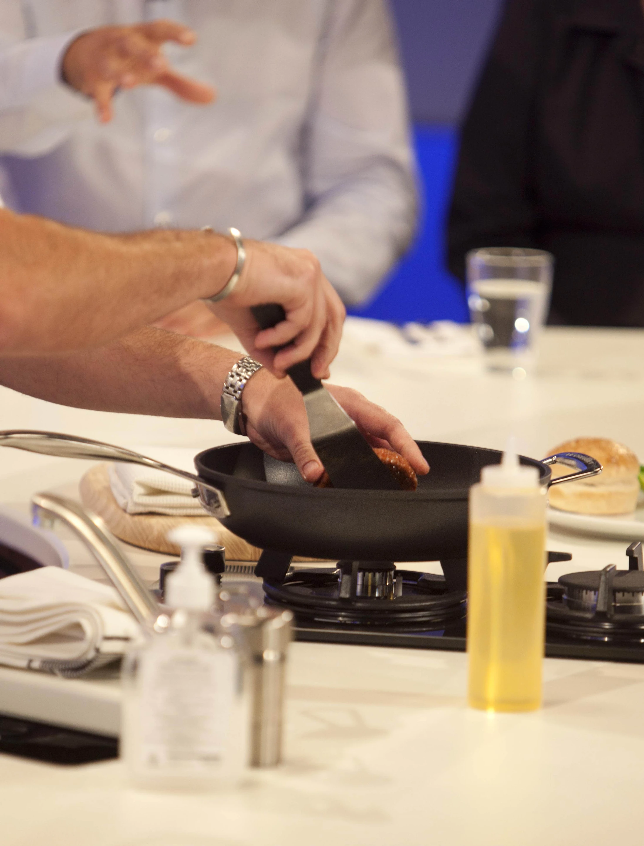 The cultured beef burger meeting the frying pan