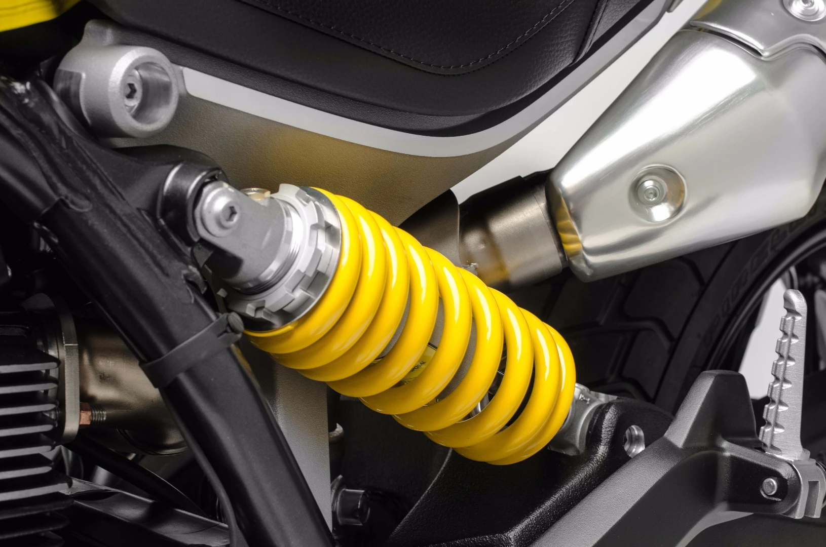 The rear Kayaba shock of the 2018 Ducati Scrambler 1100 is adjustable for spring preload and rebound damping