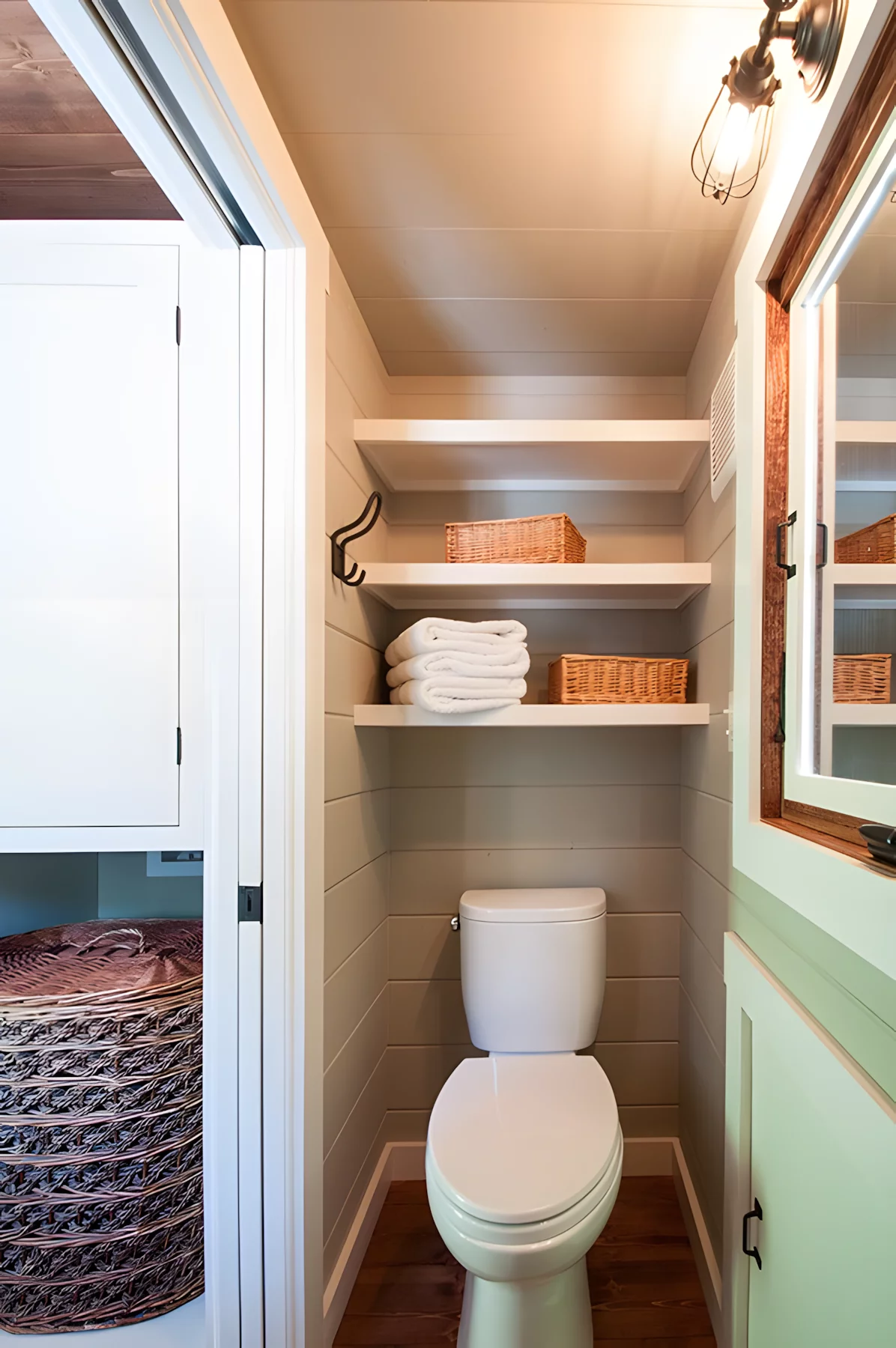 The Ynez's bathroom is very snug and includes a shower and a flushing toilet