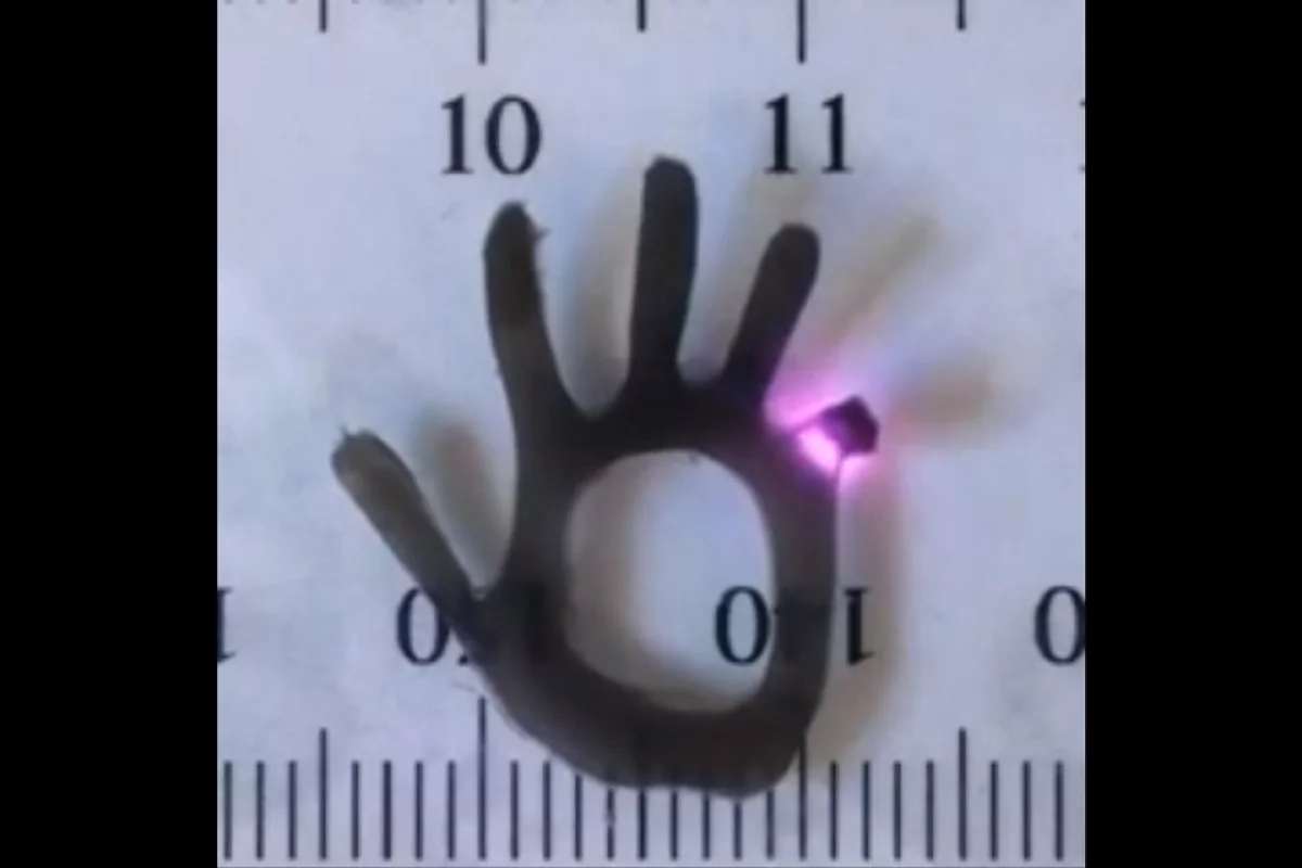 A finger on the hydrogel hand bends in response to near-infrared laser light