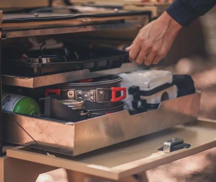 Chuk equips each box with a triple stack with deep drawer, shallow tray and flat shelf
