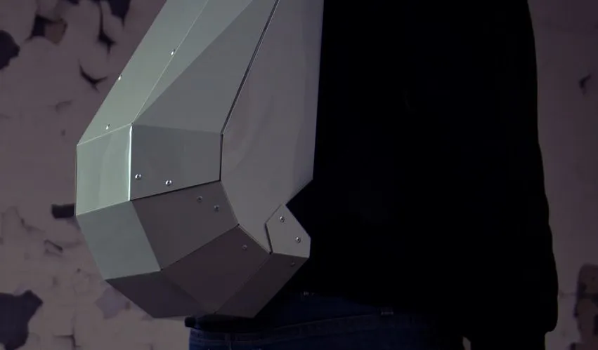 The Solid Gray backpack features a rigid foldable design, and is made from a single sheet of copolymer
