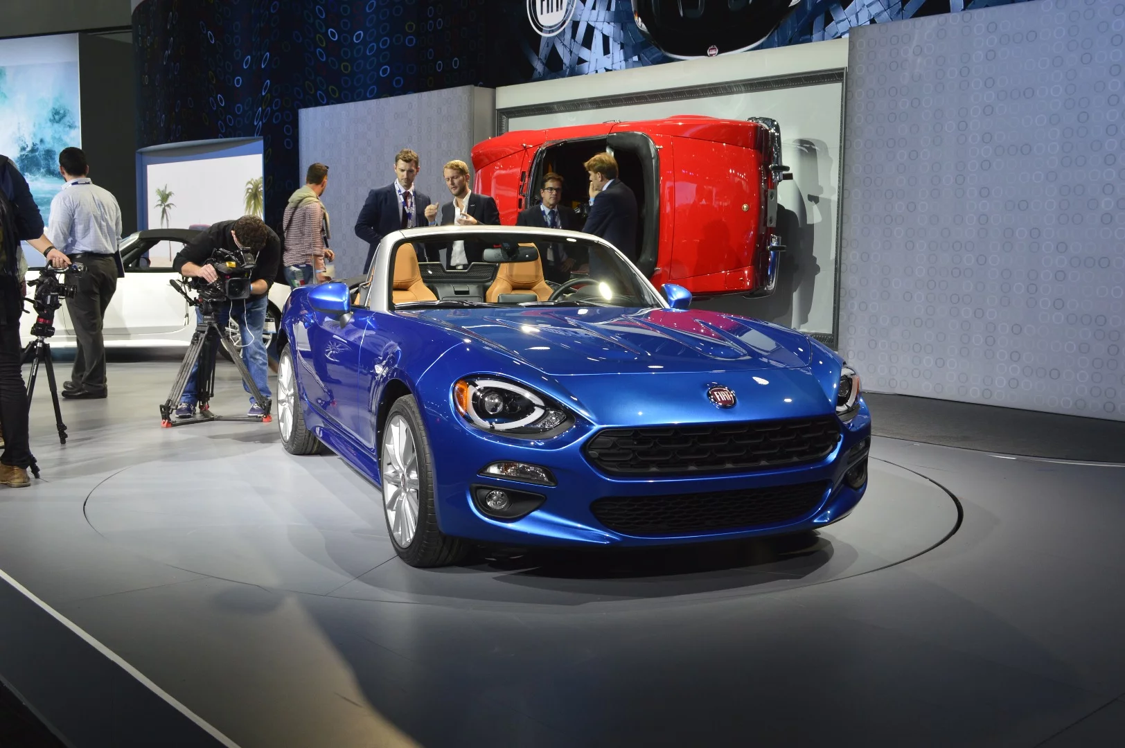 Hints of the 1960's 124 are found in the front fascia, hood work, and the badge on the deck lid