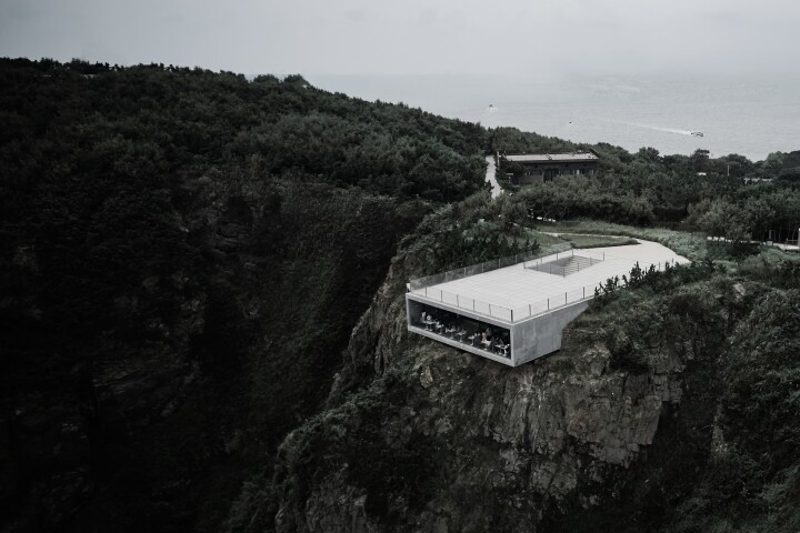 Do look down: the Cliff Café juts out of a cliff on China's Jiming Island to maximize the view of the craggy landscape