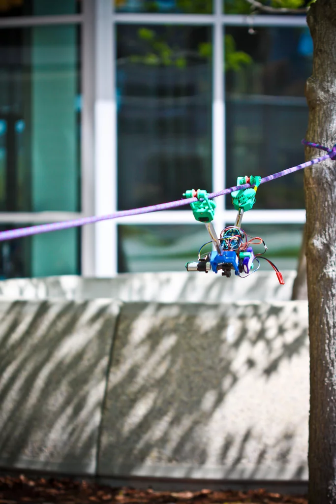 The SkySweeper robot that inches along a cable using a motorized pivoting "elbow"