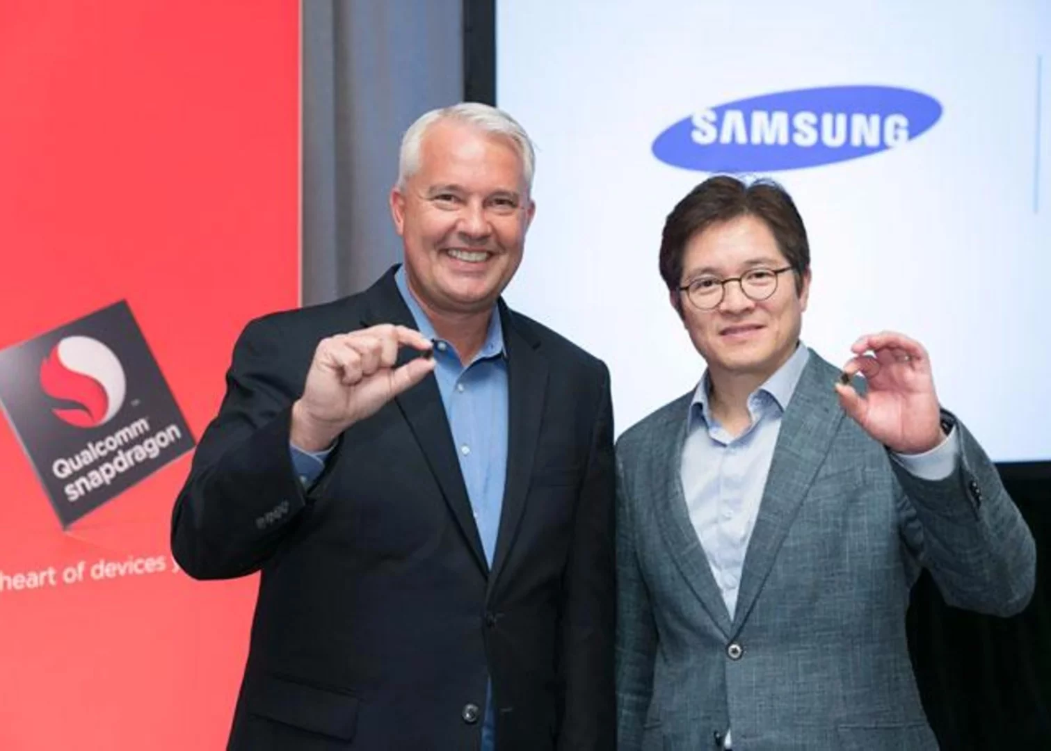 Qualcomm's Keith Kressin and Samsung's Ben Suh show off the Snapdragon 835, in New York