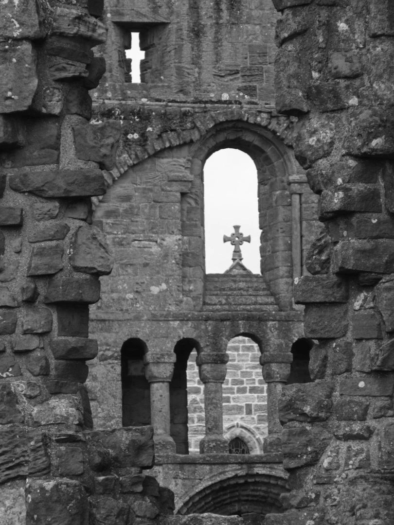 Shortlisted - Lindisfarne Priory. "Between the arches and pillars of the ruins at Lindisfarne Priory, two cross-shapes can be seen, which bring together in one shot the devotional and the martial, and hint at the site's turbulent past."